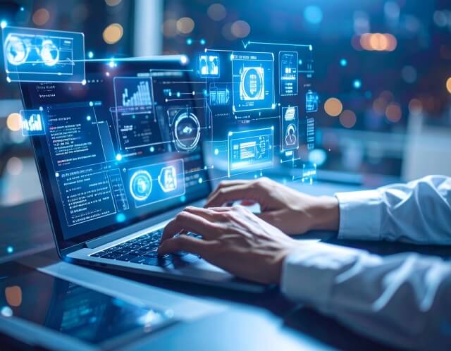 PCを使って開発作業を行う様子 | 愛知県の光学機器の設計・試作・測定 | 株式会社LABOPT